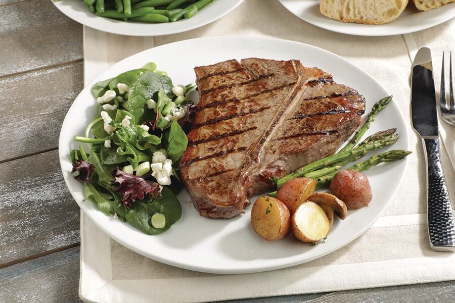 T-Bone Steaks, $6.99 Lb.